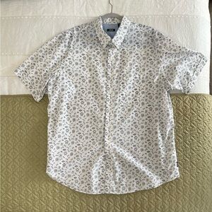Izod White Casual Button Down Shirt with Subtle Summer Themed Pattern in Blue.